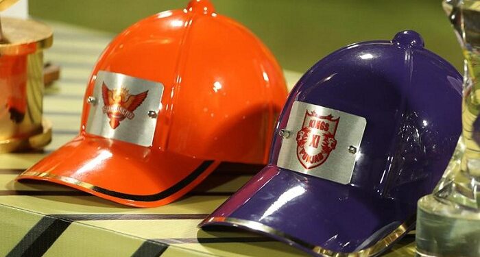 orange, purple cap battle