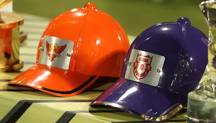 orange, purple cap battle