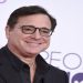 FILE - Bob Saget arrives at the People's Choice Awards at the Microsoft Theater on Wednesday, Jan. 18, 2017, in Los Angeles. Saget, a comedian and actor known for his role as a widower raising a trio of daughters in the sitcom “Full House,” has died, according to authorities in Florida, Sunday, Jan. 9, 2022. He was 65. (Photo by Jordan Strauss/Invision/AP, File)