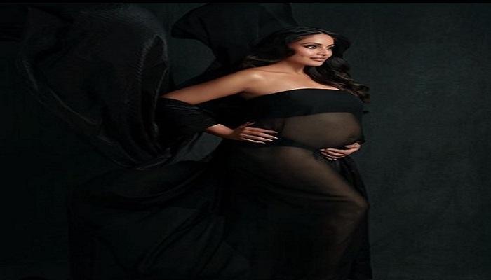 Bipasha Basu flaunts baby bump in black transparent gown