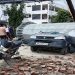 A heavy electricity pole fell on the car