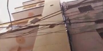 Panic due to tilting of four storey building