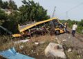 School bus and train collide
