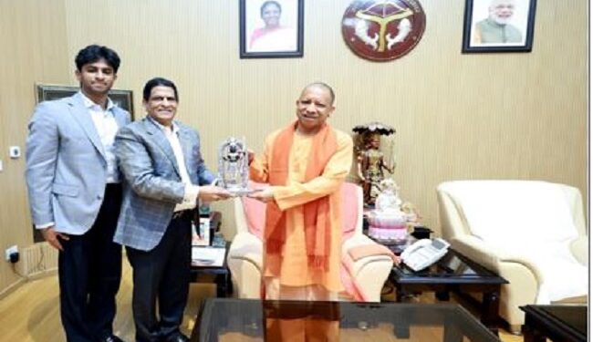 Sify Chairman Raju Vegesanane meets CM Yogi