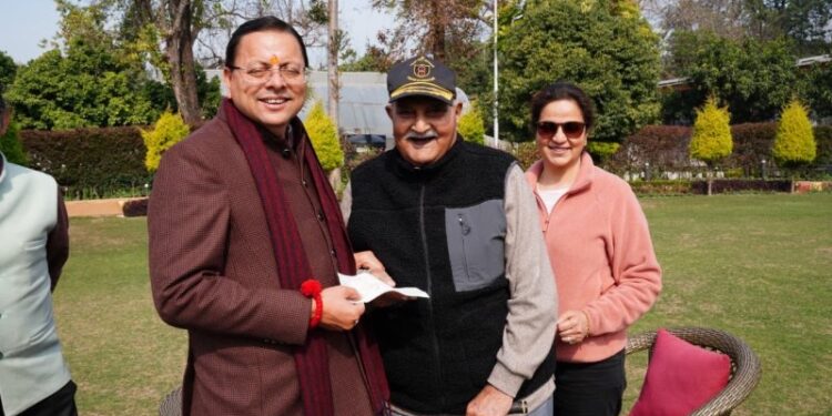 Retired Brigadier met CM Dhami and handed over the cheque.