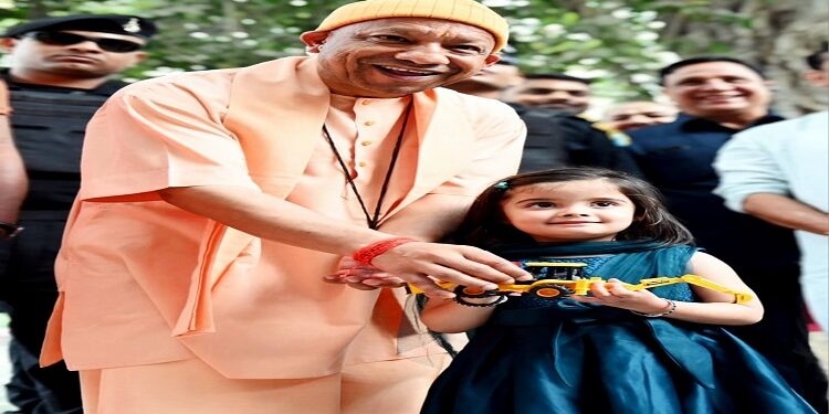Yashaswini gifted a 'bulldozer' to CM Yogi Adityanath
