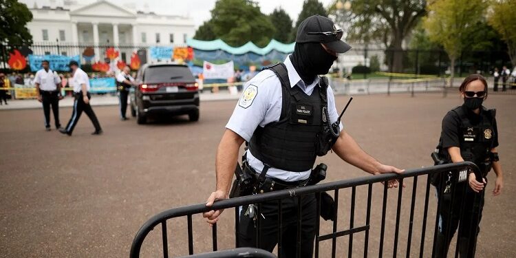 A van broke through a security barricade at the White House.