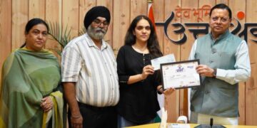 CM Dhami honored meritorious students
