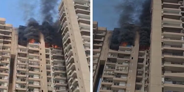 Massive fire breaks out in high-rise building