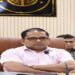 executive officers suspended on bribery charges