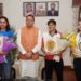 CM Dhami honors international boxer daughters.