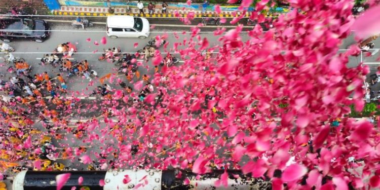 Flowers were showered on Kanwar pilgrims from a helicopter.