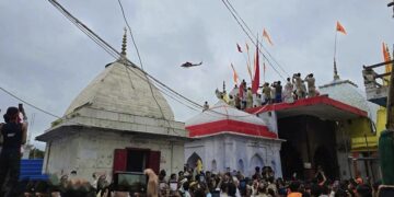 Flowers showered on Shiva devotees at Lodheshwar Mahadeva.