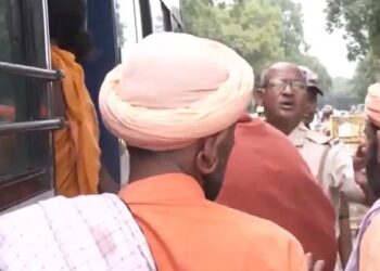 Sadhus and saints protest outside Rahul Gandhi's residence.
