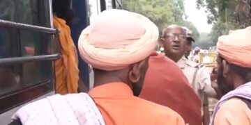 Sadhus and saints protest outside Rahul Gandhi's residence.