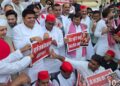 SP MLA staging a sit-in protest