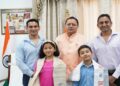 CM Dhami commends young mountaineers Riyansh and Prisha.