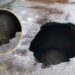 road caves in near IT Crossing.